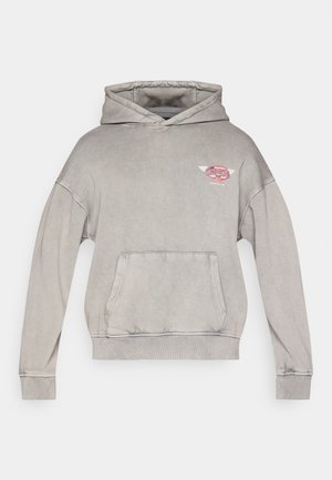 Gray oversized hoodie made of cotton blend, featuring a front pocket and a small logo with wings on the left chest area.