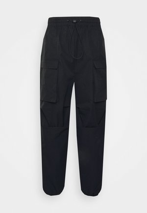 YOURTURN UNISEX - Oldalzsebes nadrágok - black