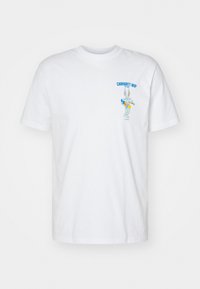 T-shirt bianco in cotone con una stampa grafica multicolore di un personaggio dei cartoni animati sul lato sinistro del petto. Maniche corte, design a girocollo.