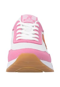 White sneaker with pink accents, textured mesh upper, pink suede overlays, and white laces. Rubber sole with a geometric tread pattern.