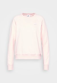 Ljusrosa sweatshirt med rund halsringning, ribbade ärmslut och nederkant. Har en liten vit Nike-logotyp på vänster bröstområde. Slät textur.