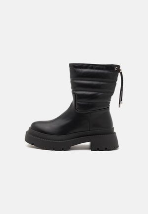 YUMI - Classic ankle boots - black