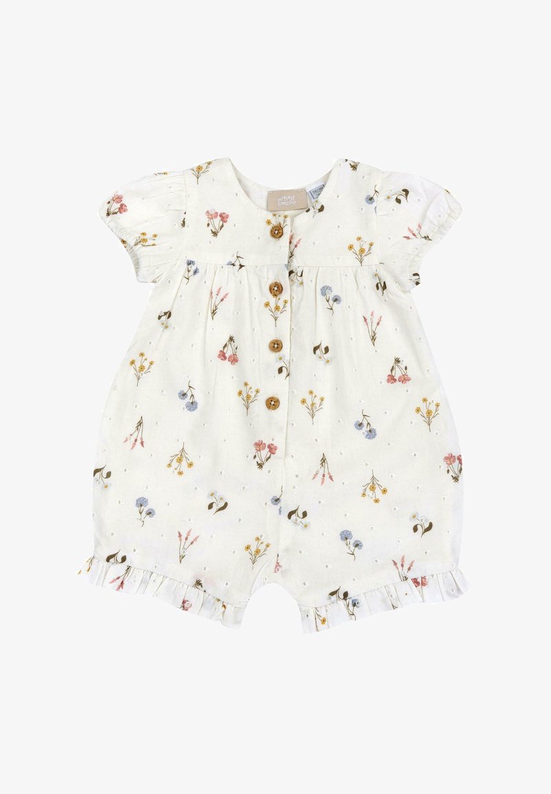 Combinaison à motif floral en tissu crème, dotée de manches courtes bouffantes, d'une fermeture à boutons en bois et de volants au niveau de l'ourlet.