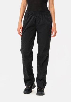 Pantalons de plein air noirs avec une taille élastique, coupe droite et genoux renforcés. Le matériau est léger, résistant à l'eau et d'une texture lisse.