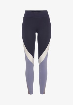 Navy and lilac leggings with a high waistband, featuring curved panels in light grey and darker tones, made of a stretchy fabric.