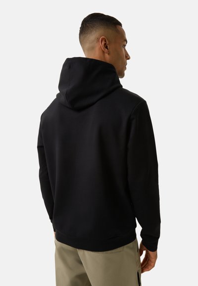 Black pullover hoodie, soft fabric, features a large hood and kangaroo pocket, smoothly tapered fit, ribbed cuffs, and hem.