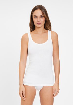 White cotton tank top with a scoop neckline and wide straps. Smooth texture, fitted shape, and a minimalist design.