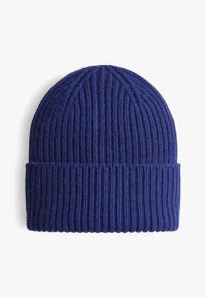 Blauer gestrickter Beanie mit geripptem Muster und umgeschlagenem Rand. Hergestellt aus weichem, warmem Material, geeignet für kaltes Wetter.