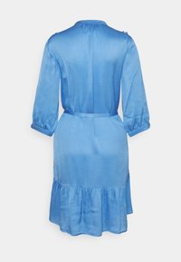 Blue satin dress with three-quarter sleeves, fitted waist belt, and ruffled hem, shown from the back against a white background.