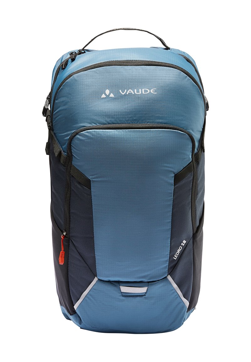 Sac à dos Vaude bleu et noir avec une finition texturée, plusieurs compartiments zippés et une poignée supérieure pour le transport. Inclus des accents réfléchissants.