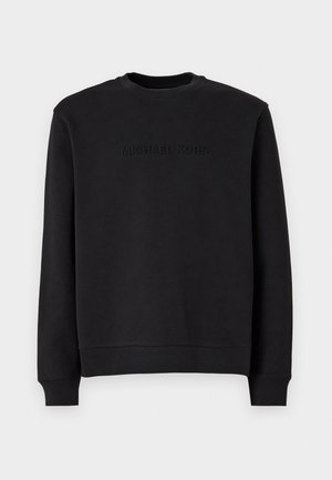 Black sweatshirt made of soft fabric, features a crew neck, long sleeves, and embossed "MICHAEL KORS" logo at the chest.