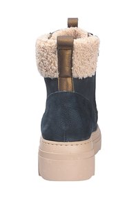 Stivaletto in pelle nera con suola in gomma color beige, dotato di un morbido colletto in ecopelliccia beige e di un accento bronzeo sul retro.