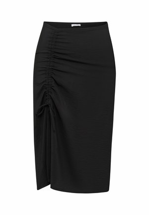 Gonna nera fino al ginocchio con dettaglio arricciato e fiocco laterale regolabile, realizzata in tessuto leggermente strutturato con orlo dritto.