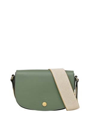 Green leather crossbody bag with a flap closure, gold hardware, and a textured cream strap. Features a subtle logo embossing.