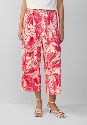 Brede broek met bloemenpatroon in zachte stof, met een roze en crème kleurenschema. Elastische tailleband met een trekkoord voor een goede pasvorm.