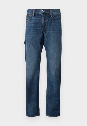 Jeans de mezclilla de un azul oscuro con un diseño de pierna recta, bolsillos frontales y un bolsillo lateral tipo cargo. Incluyen detalles de costura y un cierre de botón.