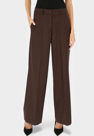 - Spodnie materiałowe