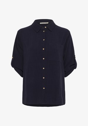Navy blue button-up shirt, short roll-up sleeves, single chest pocket, wooden buttons, lightweight fabric with a subtle texture.