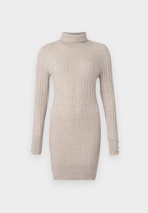 Beige cable-knit turtleneck sweater dress with long sleeves and button details on the cuffs, fitted silhouette.