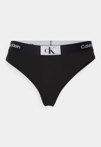 Perizoma nero in tessuto elasticizzato, con fascia elastica a contrasto riportante il logo "Calvin Klein" e "cK".