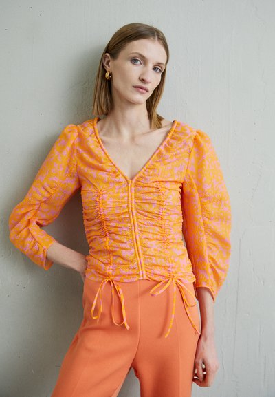 Rodebjer T-shirt à manches longues - orange haze