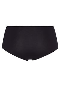 Pantaloni intimi neri a vita alta realizzati in tessuto liscio, con un design senza cuciture, che offre una copertura totale sul retro e senza parti metalliche visibili.