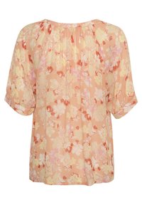 Blouse florale légère avec un fond pêche, ornée de fleurs pastel, à manches courtes et coupe ample et décontractée avec un détail froncé au niveau du col.