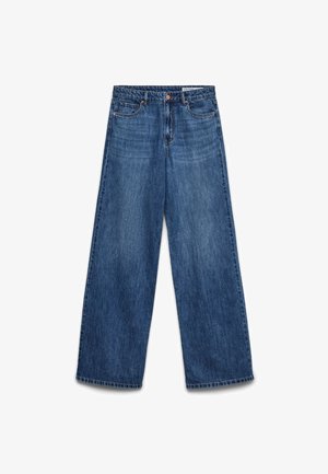 Siniset leveälahkeiset farkut, joissa etutaskut, vyölenkit sekä nappi- ja vetoketjukäyttö.