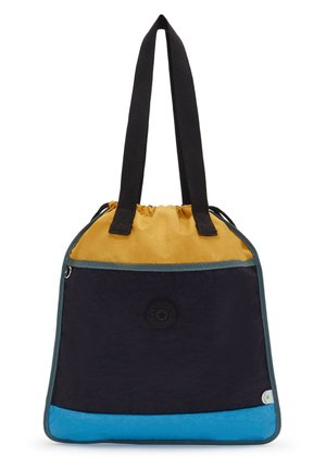 Taske med gul top, sort midte, blå bund, sorte dobbelte håndtag og en rund logo-patch i midten af frontpanelet.
