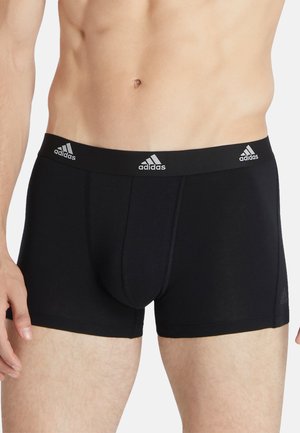 Boxer shorts de algodón negro con un ajuste ceñido, que cuentan con una amplia cinturilla elástica con tres logotipos de Adidas en gris. Textura suave y sin patrones.