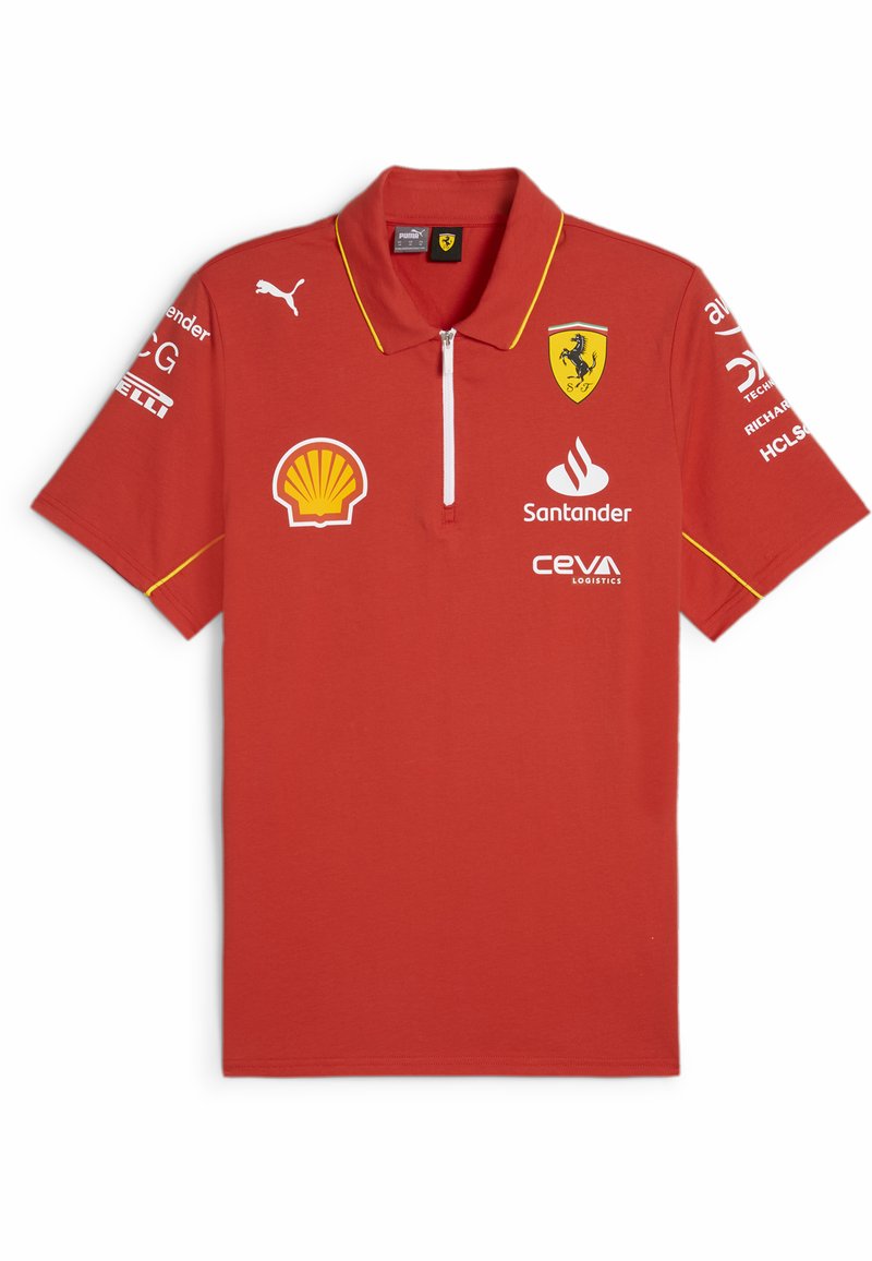 Czerwona koszulka polo z krótkimi rękawami, zamkiem przy kołnierzyku, żółtymi akcentami i wieloma logo, w tym Ferrari, Puma i Shell. Materiał mieszanki bawełny.