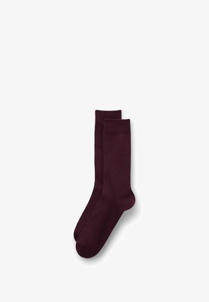 Calcetines de algodón burdeos de caña corta con una textura suave, que presentan un talón reforzado y un puño acanalado para mayor comodidad y ajuste.