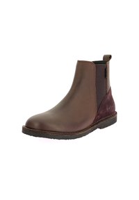 Botín Chelsea de cuero marrón con paneles laterales elásticos, punta redondeada y tacón de ante burdeos texturizado. Suela de goma resistente con detalles de costura.