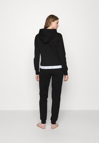 Guess JOGGER PANT - Pyjamasbukse - black