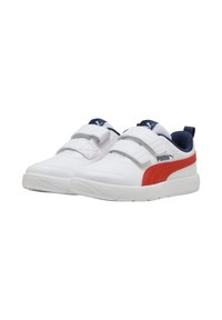 Scarpe da ginnastica bianche con accenti rossi e blu navy, caratterizzate da una tomaia sintetica liscia, doppie cinghie a strappo e suole in gomma.