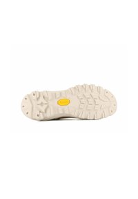 Semelle extérieure en caoutchouc Vibram avec un motif lug texturé ; couleur principalement beige ; présentant un logo Vibram jaune au centre.