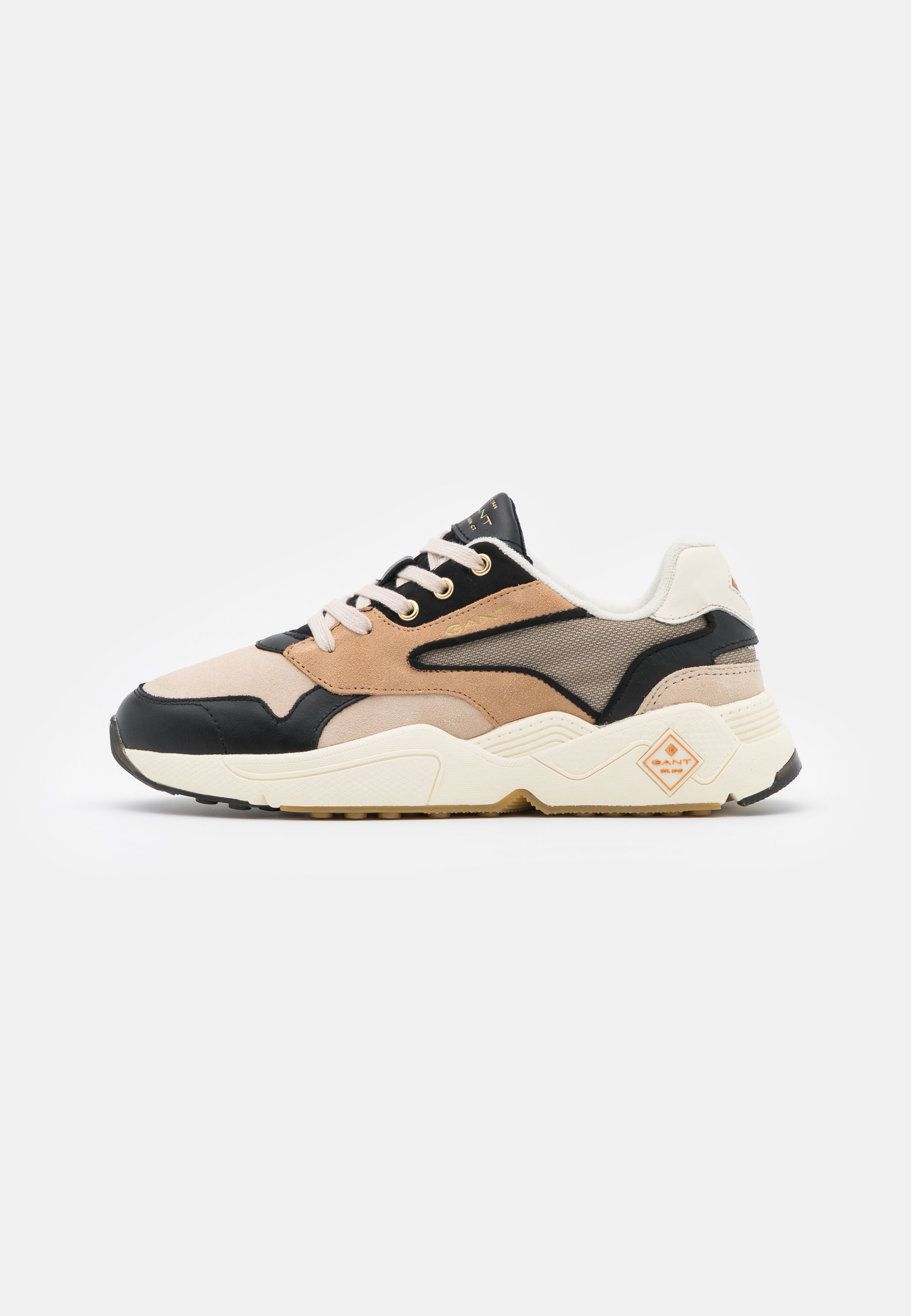 beige running trainers