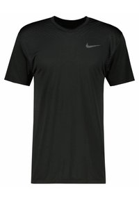 T-shirt preto da Nike com mangas curtas, design em V e acabamentos texturizados nos ombros. Apresenta um pequeno logo cinza da Nike no lado esquerdo do peito.