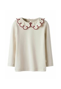 Blusa de manga larga beige con un cuello burdeos con volantes. Tiene una cremallera en la parte trasera y está hecha de una tela suave. Sin patrones ni adornos adicionales.