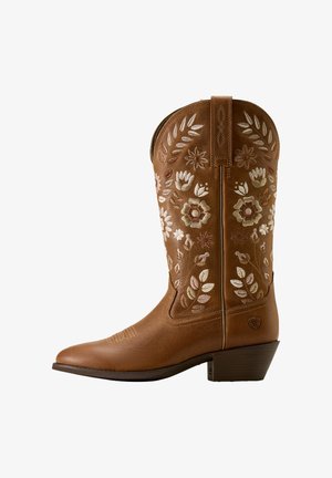 Brauner Leder-Cowboystiefel mit Blumenstickerei in Pink, Beige und Weiß. Verfügt über eine spitze Zehenpartie und einen niedrigen Blockabsatz.