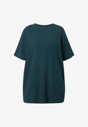 T-shirt oversize a maniche corte di colore verde scuro con scollatura rotonda e orlo dritto, esposto su uno sfondo bianco.