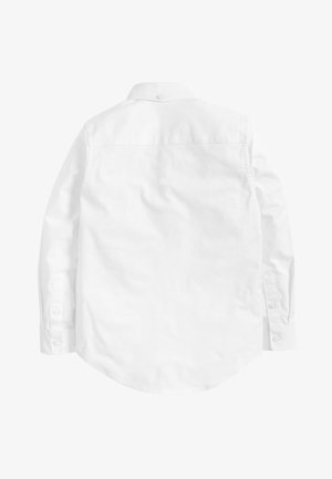 Camisa blanca de manga larga, material de algodón, cuello con botones, dobladillo recto, con puños abotonados y canesú central en la espalda.