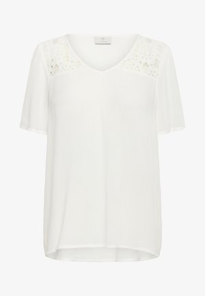 Bílý top s krátkým rukávem, který má výstřih do V, texturované tělo a květinové krajkové detaily na ramenou. Měkká, lehká tkanina.