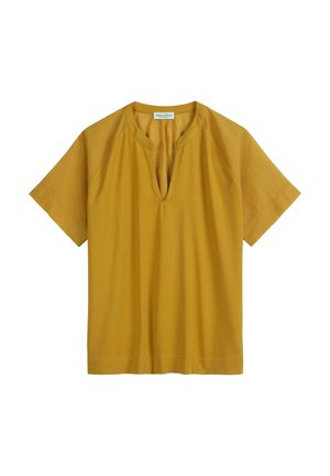 Mosterdgele top met korte mouwen, relaxed fit, diepe V-hals en een zachte textuur. Heeft raglanmouwen en een rechte zoom.