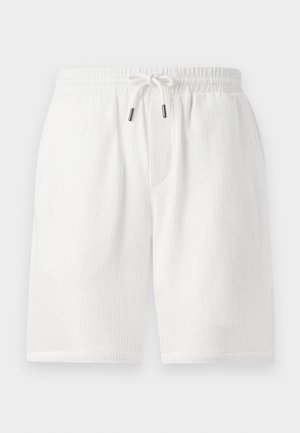 Shorts blancs texturés avec une taille élastique, fermeture à cordon, poches latérales et coupe décontractée. Convient pour une tenue décontractée.