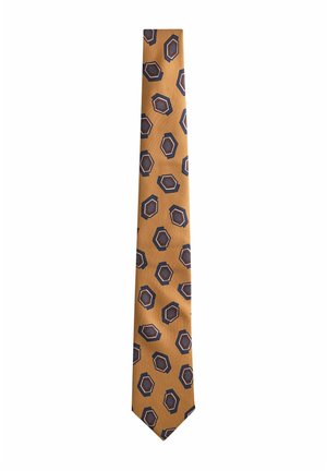 Cravatta giallo senape con motivo esagonale ripetuto nei colori marrone, blu navy e azzurro chiaro.