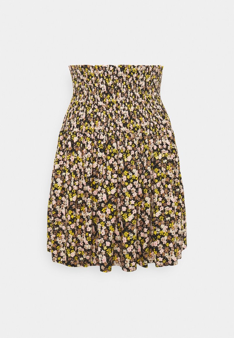 Jupe fleurie taille haute avec ceinture smockée, ornée de petites fleurs roses, jaunes et blanches sur fond noir.