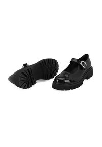 Zwarte lakleren Mary Jane schoenen met een ronde neus, chunky rubberen zool en een decoratieve riem met een accentdetail.
