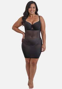 Vestito modellante nero con una texture liscia e trasparente; design aderente con spalline regolabili; lunghezza al ginocchio, che mette in risalto la silhouette.