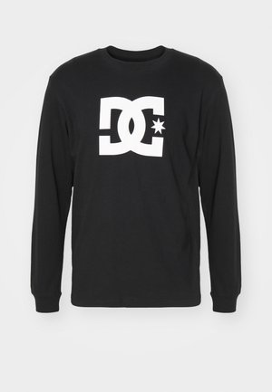 Black long-sleeve cotton T-shirt featuring a large white DC logo with a star, round neckline, and ribbed cuffs.